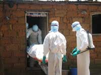 Medical officers in Uige, Angola, preparing for the safe transport and burial of fatal cases of Marburg haemorrhagic fever in 2005 (Photo: WHO)
