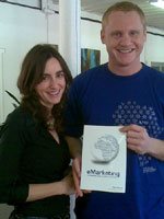 Sarah Blake and Rob Stokes proudly show off the Quirk eMarketing textbook, eMarketing - The Essential Guide to Online Marketing. Pic courtesy of .