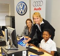 From left, Shangri-la Community Development Project Director Amor Malan, Volkswagen of SA Dealer Academy Manager Helen Hemsley, and End-User Computing Learnership participant Nokuthula Mthembu.