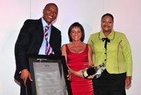 Cattle Baron Sunridge Village was named the winner of the Spectrum Award for National Retail of Year: Sisa Ngebulana (President SACSC) (left), Maria Frangopoulos (Cattle Baron) and Nomzamo Radebe (Pareto).