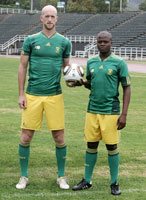 Matthew Booth and Lucas Thwala model the new jersey.