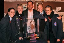 (L - R): National winners from Swartkop High School - Lanthe Louw, Mareli Jooste, Bianca de Beer and Bianca Boshoff - pictured here with Strijdom van der Merwe and the trophy he designed for the competition.