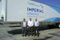 Peter Viljoen of Imperial Logistics, Gert van Rooyen of Serco and Leonard Hyman also of Imperial Logistics in front of one of their vehicles fitted with an ecoFridge unit.