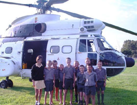 Young EW Gordon (second from left) invited his sister and nine of his closest friends to join him for a helicopter ride in an 8 ton Oryx.