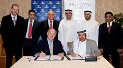 The MA signing ceremony picture (sitting - from left) Rudi Jagersbacher - president, Middle East and Africa, Hilton Worldwide; HE Khalaf Bin Ahmad Al Otaiba. (Standing from left) Richard Goesling – general manager, Hilton Sharjah; Carlos Khneisser – vice president, Development, Middle East, Hilton Worldwide; Wagdi Hamdy - advisor to the chairman, Bin Otaiba Investment Group; Hamad Bin Khalaf Al Otaiba; Mohamed Bin Khalaf Al Otaiba, and Mohan Krishan – CFO, Bin Otaiba Investment Group.