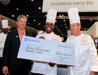 Petrus Madutlela receives his cheque from Craig Elliott, executive chef, Unilever Food Solutions.