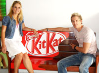 L to R: Kirsten Randall, national sales manager and Brandon Whitehead, media consultant of Campus Media on the branded Kit Kat bench