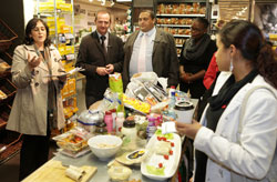 Woolworths dietician, Nasreen Jaffer (left) addressing mothers as two of the Woolworths store managers look on.