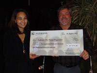 Sacha Claassen and Andy Scott of Nedbank with the donation cheque.