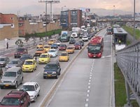 TransMilenio dedicated bus lane, Bogota. Source: .