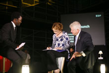 Premier of the Western Cape, Helen Zille signs the EDP Expression of Interest Form in front of MEC Alan Winde and event MC, Africa Melane.<p>Image: Yasser Booley