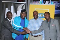 Eugene Khoza (GM sales and marketing at SABC), Robert Marawa (Sport Centre host), Serame Taukobong (CMO at MTN SA) and Martin Vilakazi (Metro FM). Image by Timnyc