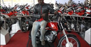 Honda Kyalami donates bike to shack fire victim