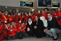 Abigail le Roux (PR and National Promotions manager at Ster-Kinekor), Rhae Shawn Kabantu (Cinema Park channel manager) and Darren Hampton (brand marketing manager at Ster-Kinekor) with the Free My Lambs Primary School children.