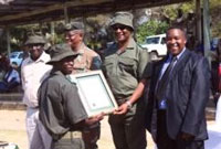 CEO of SANParks, Dr David Mabunda congratulates the 49 new field rangers of the Kruger National Park. (Image: SANParks)