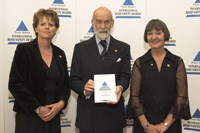 Award winners Charlotte Sullivan (left) and Caro Smith from South Africans Against Drunk Driving, receive the prestigious Prince Michael International Road Safety Award from HRH Prince Michael of Kent (middle).