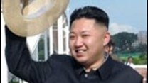 An official North Korean picture proving that Kim Jong-un does indeed not have a piggy snout or piggy ears. (Image: Wikimedia Commons)