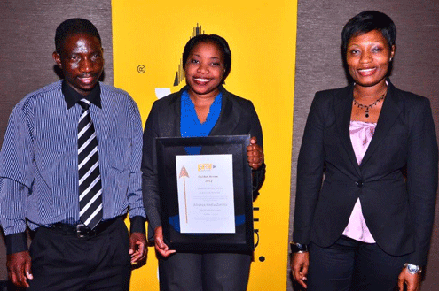 The Alliance Media Zambia Client Service team is pictured accepting the award, (from left to right), Andrew Munyaka, Mwenda Shambana and Musoma Hachipuka.