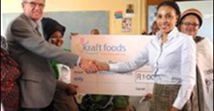 Pat Senne, Kraft Foods Director Corporate and Government Affairs for Southern and Central East Africa (right), hands over cheque to Niels Matthiessen, Humana’s Country Director