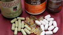 inacea, left, fish oil, centre, and glucosamine pills are shown in San Francisco. Eating a lot of oily fish or taking potent fish oil supplements may increase a man's risk of developing prostate cancer, new research suggests.
