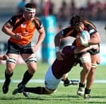 The University of Johannesburg’s RJ Liebenberg, who was named forward player of the tournament, evades a tackle in the recent USSA national student rugby championship final. UJ also took gold in the men’s hockey and squash tournaments.