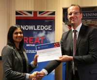 Beverly Singh receives her Bloodhound SSC Chevening Scholarship from the UK's deputy high commissioner in South Africa, Martin Reynolds. (Image: )