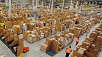 Amazon's UK distribution centre. Amazon will provide vouchers to customers who received their parcels after Christmas. Image: