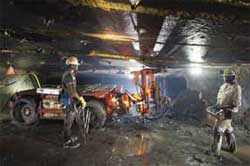 Workers underground at an Amplats mine. Restructuring costs in Amplats mines have resulted in losses for the year to December. Image: Amplats