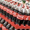 Disappointing sales, weak outlook hit Coca-Cola