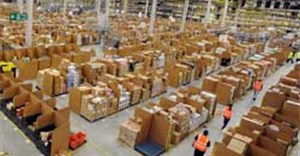 Amazon's distribution centre in the UK. Twitter users can now connect their account to Amazon and add items direcly to their cart and then pay for them when they next log on. Image: