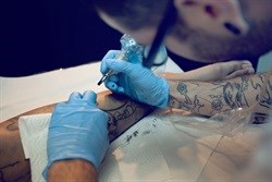 Tattoo acceptance in the workplace a debatable issue