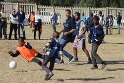 Ryan Giggs playing soccer with the children from the Sport for All project in Katlehong.