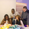 Mandela Day at Arup delivers scarves for children