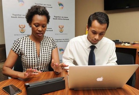 Deputy minister of communication, Stella Ndabeni-Abrahams and Aslam Levy conducting a Twitter chat.