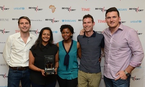 Best New Project, Dance4Change, Andy Darby-Welsh - Director of Operations, Navjeet Sira, Change Foundation and Olly Dawson, Sport Relief collect the award from Graeme Smith Carol Tshabalala during day 4 of the Beyond Sport Summit 2014 at Vodacom World on October 30, 2014 in Johannesburg, South Africa. (Photo by Lee Warren/Gallo Images)
