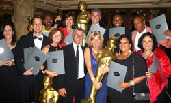 NMMU’s Marketing and Corporate Relations Department led by Pieter Swart (back, centre) won the overall top award for outstanding performance among marketing and communication practitioners in higher and further education in SA at the Marketing, Advancement and Communication in Education (MACE) Excellence Awards. Front centre is event sponsor, Dr Riaan Els, CEO of the Fuchs Foundation. (Caption and image extracted from the