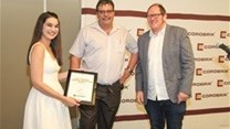 Amy Thompson is pictured receiving her award from Christie van Niekerk of Corobrik, right is Dr Julian Raxworthy from the University of Cape Town.