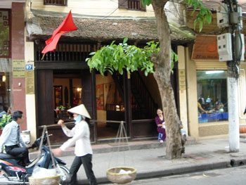 A typical street in Hanoi.... corruption at the top detrimentally affects the lives of the citizens. (Image: Public Domain)