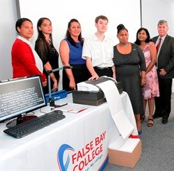 False Bay College Receives a sponsored prize from ACSA at the Award Handover Event: Jacqueline Lenting (False Bay College Occupational Therapist), Adele Ebrahim (False Bay College Occupational Therapist), Karin Hendricks (False Bay College DCEO: Education and Training), Nicholas Stevens (False Bay College Visually Impaired Student), Hendrietta Bogopane-Zulu (Deputy Minister of the Department of Social Development), Jaqueline Layman (False Bay College Student Support and Development Services Man