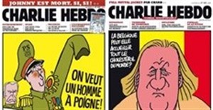 Charlie Hebdo team struggles to heal after massacre