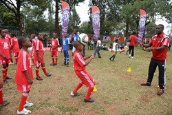 Spur Masidlale and Orlando Pirates distribute kits at soccer clinic