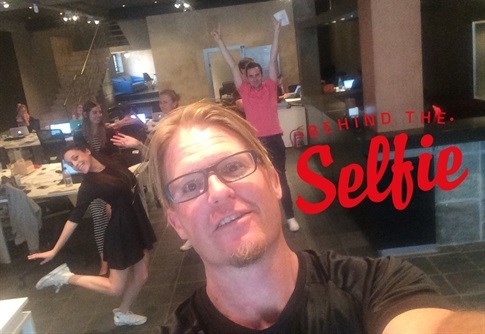 Selfie, complete with photobombs. Strange things happen when taking a selfie at Roed's place of work.