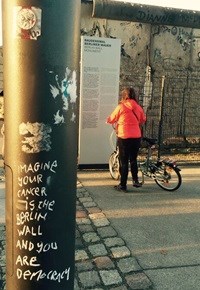 His chalk messages have even appeared at the Berlin Wall