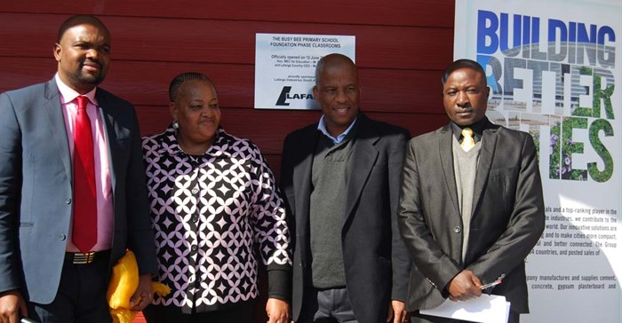 L-R: Acting GM of Lafarge Cement, Tshepiso Dumasi, director of Busy Bee Primary School, Gloria Padi, DDG of Education, Edward Mosuwe, and the principal of Busy Bee Primary School, Elvis Ncube