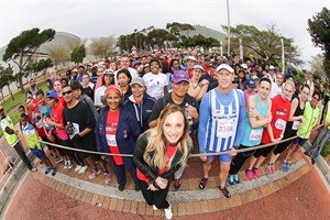 Top Billing presenter Jade Hubner poses with eager walkers at the start