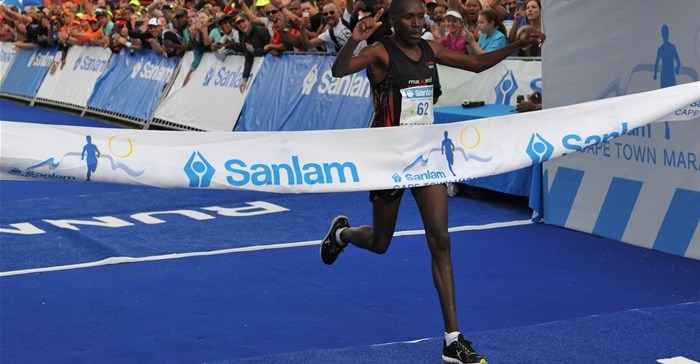 Shadrack Kemboi crosses the finish line at the Sanlam Cape Town Marathon