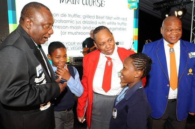 Shaun Makwala and Dimpho Thibela from Olifantsvlei Primary School with Cyril Ramaphosa, Chairperson of Adopt-a-School Foundation at Adopt-a-School Foundation’s annual Back to School Party.