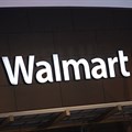 Wal-Mart cuts profit outlook, sending shares plunging