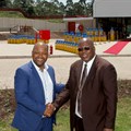 Simphiwe Mehlomakulu, Reatile Gaz Chairman is congratulated by Mike Mabuyakhulu, MEC for Economic Development, Tourism and Environmental Affairs, at the opening of a new depot by Reatile Gaz in Hammarsdale, KwaZulu-Natal.