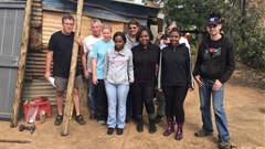 BMi Research builds two homes for needy families
